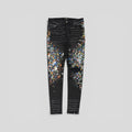 Amiri Distressed Paint Splatter Jeans in Aged Black