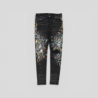 Amiri Distressed Paint Splatter Jeans in Aged Black