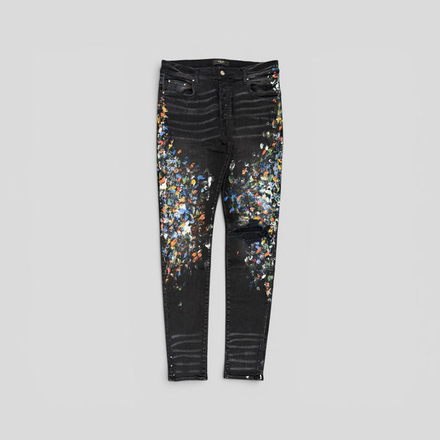 Amiri Distressed Paint Splatter Jeans in Aged Black