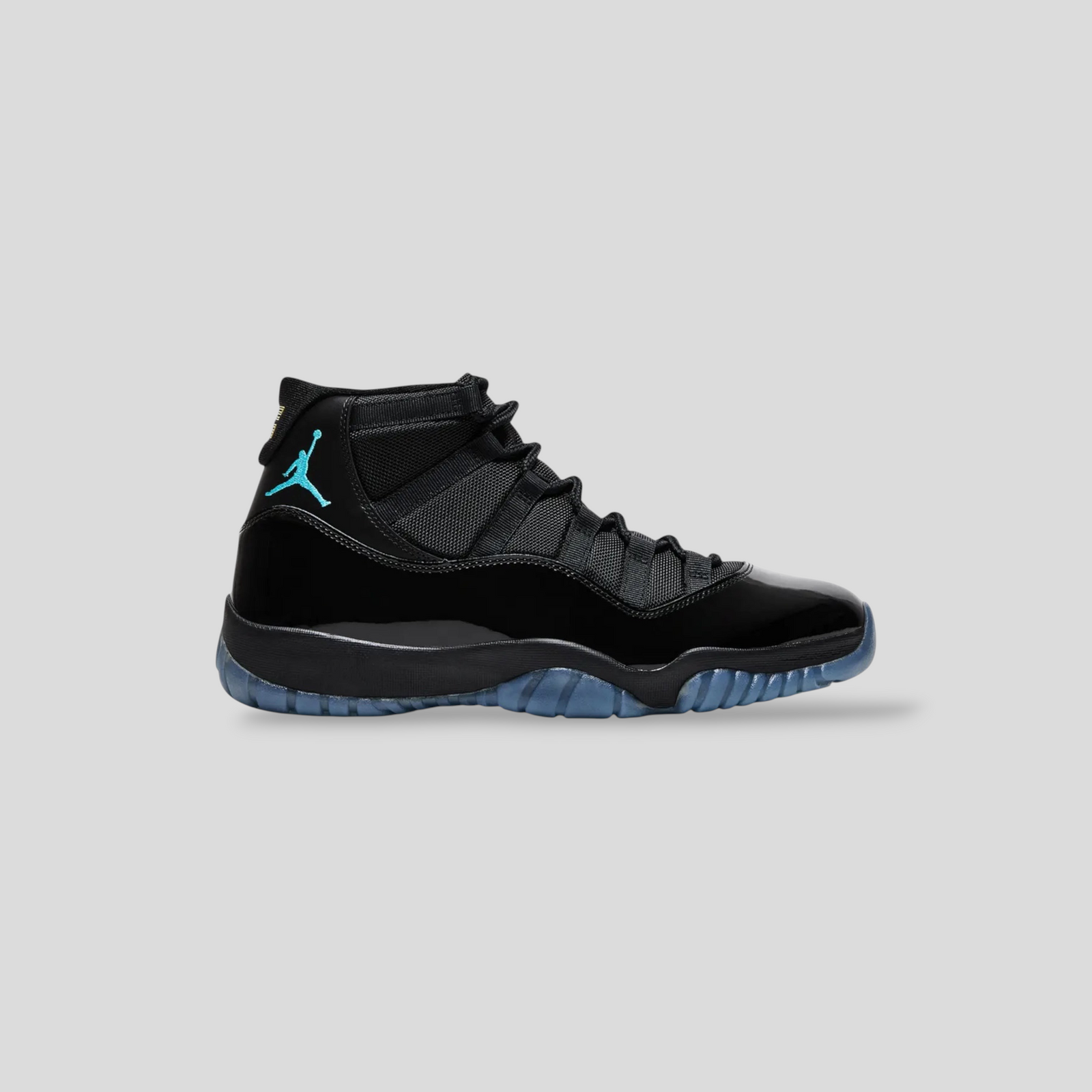CLB XXIII Air Jordan 11 Retro Gamma Blue sneaker with black patent leather, blue Jumpman logo, and translucent sole.