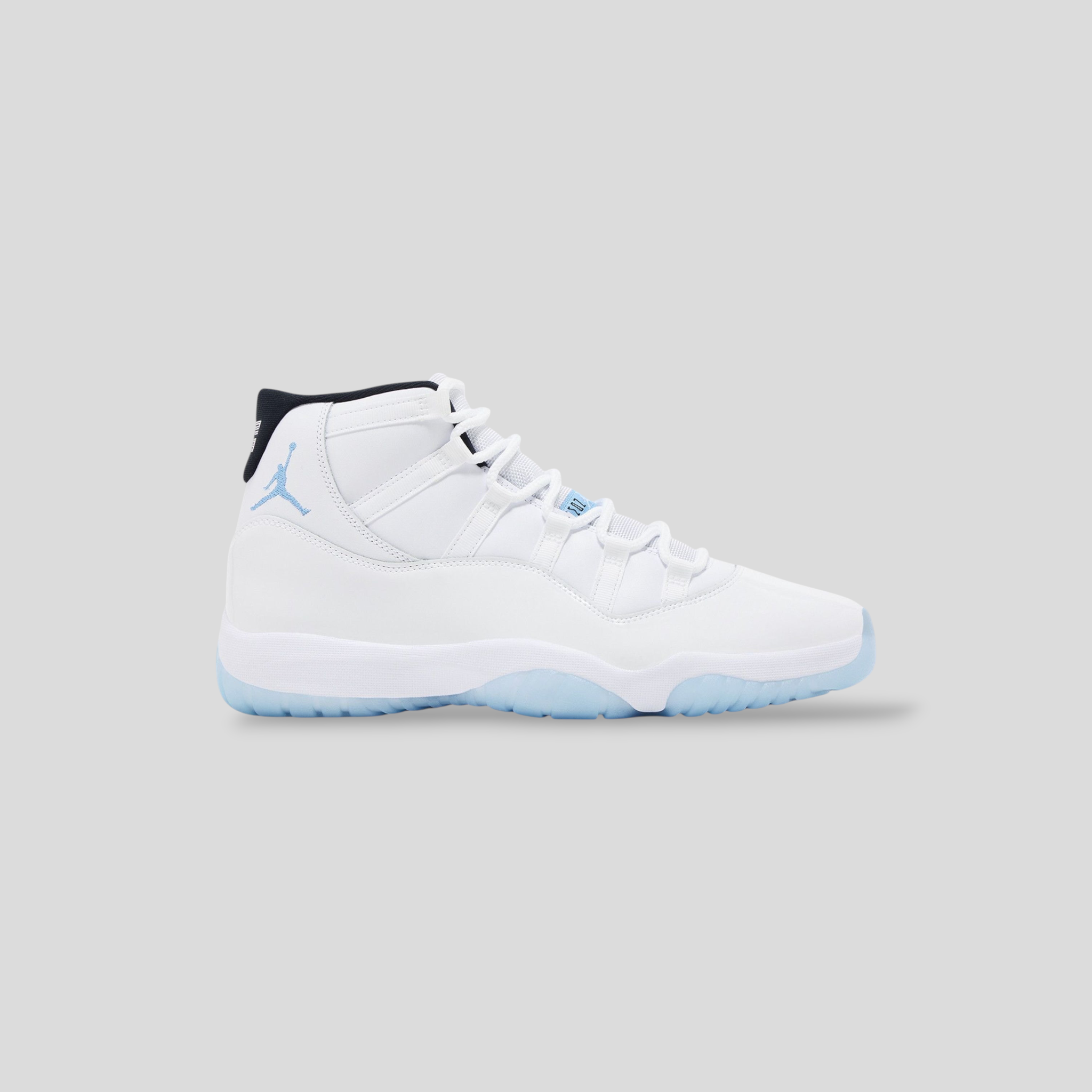 CLB XXIII Air Jordan 11 Retro Legend Blue sneakers in white leather with light blue accents and a translucent sole