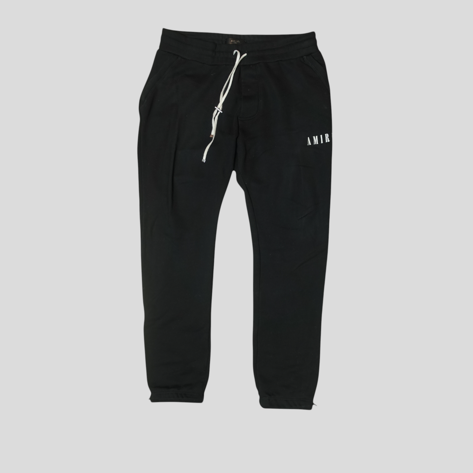 CLB XXIII Amiri black cotton sweatpants featuring a white core logo and drawstring waist.
