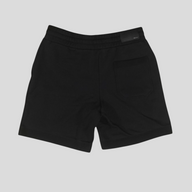 CLB XXIII Amiri black cotton sweatshorts with a back pocket and branded patch, shown from the rear view.