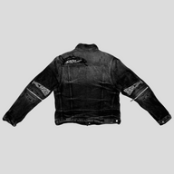 CLB XXIII AMIRI MX2 aged black denim trucker jacket featuring white bandana patch details and sleeve zippers