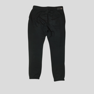 Back view of CLB XXIII Amiri black cotton sweatpants with a single rear pocket and branded tag