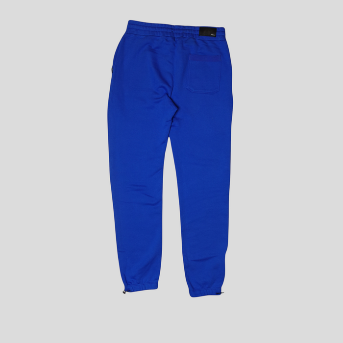 CLB XXIII Amiri blue cotton sweatpants with back pocket and drawstring cuffs, shown from the back.