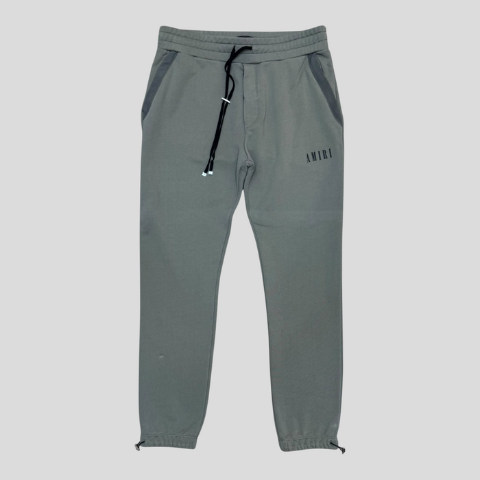 CLB XXIII green Amiri cotton sweatpants with black logo and drawstring waist