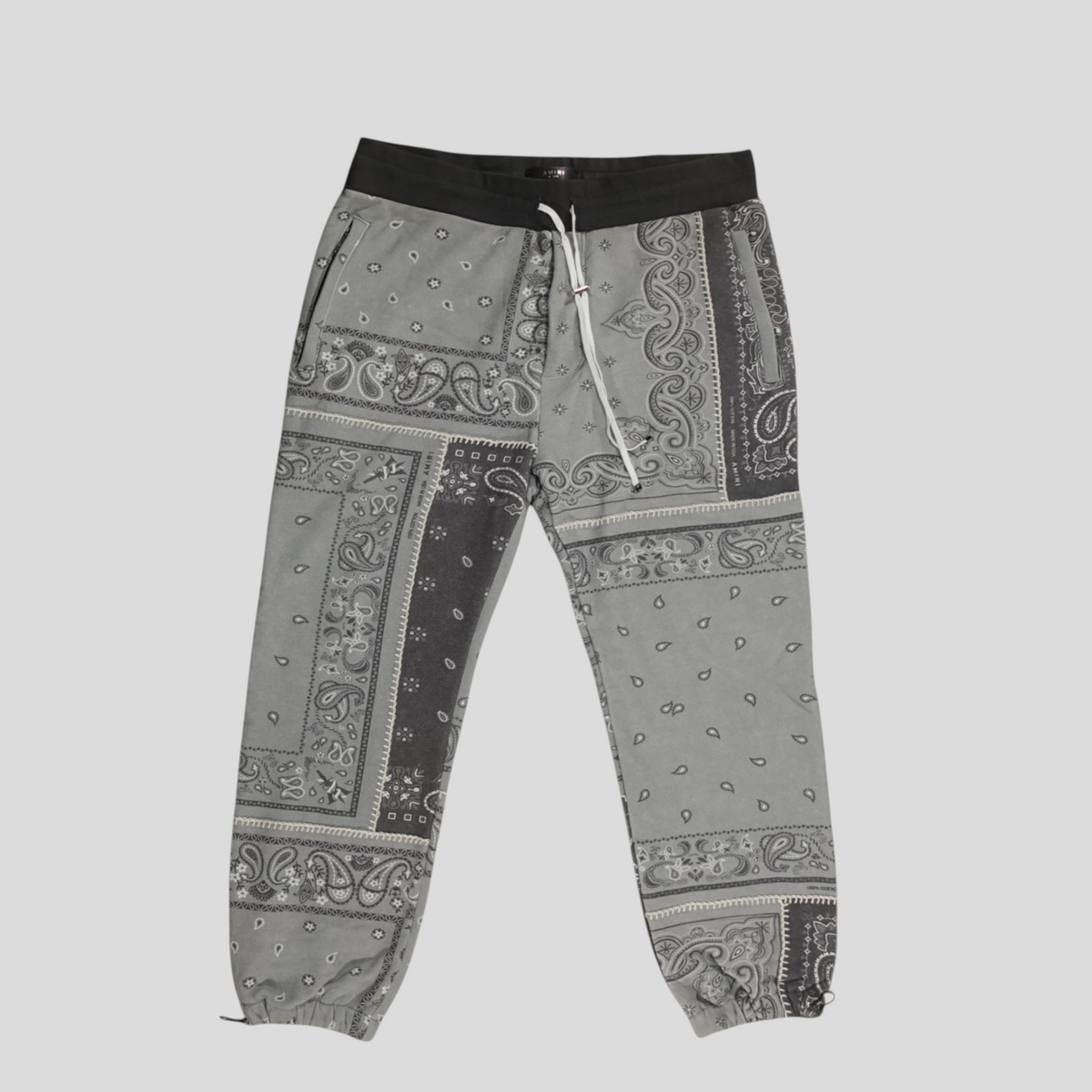 CLB XXIII Amiri Bandana Reconstruct sweatpants in grey cotton with a patchwork paisley print and black waistband