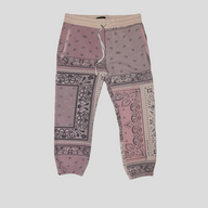 CLB XXIII Amiri pink and coral cotton sweatpants featuring a reconstructed bandana print pattern and drawstring waist.