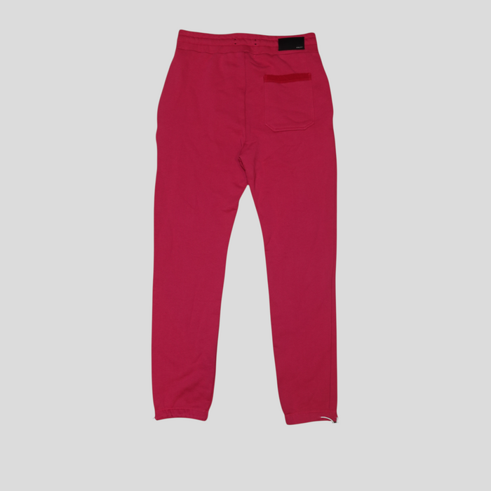 CLB XXIII pink Amiri cotton sweatpants featuring a back pocket and elasticated waistband, back view.