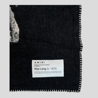 CLB XXIII Amiri X Wes Lang black wool fantasy blanket with white whipstitch edge and artist collaboration label