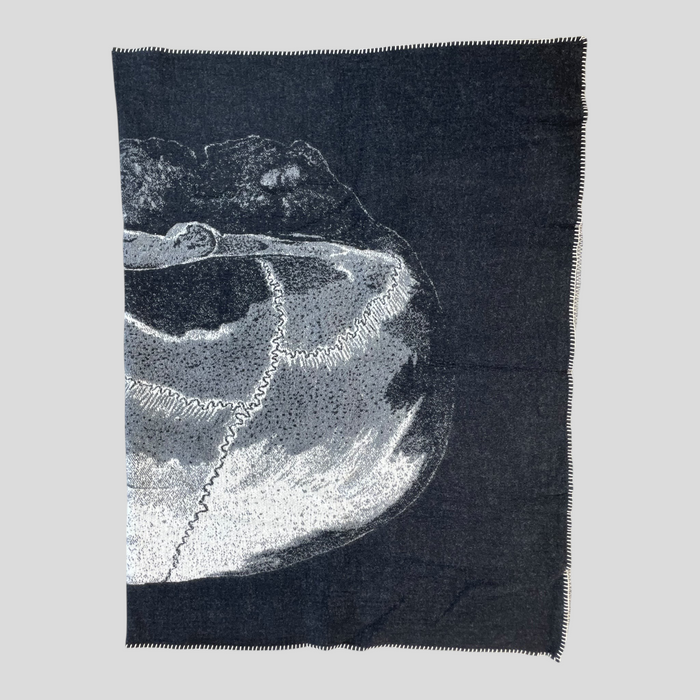 CLB XXIII Amiri X Wes Lang Fantasy blanket in black with a white abstract graphic design and whipstitch edge detail.