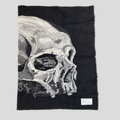 CLB XXIII Amiri X Wes Lang black wool fantasy blanket featuring a large white skull graphic and designer label patch.