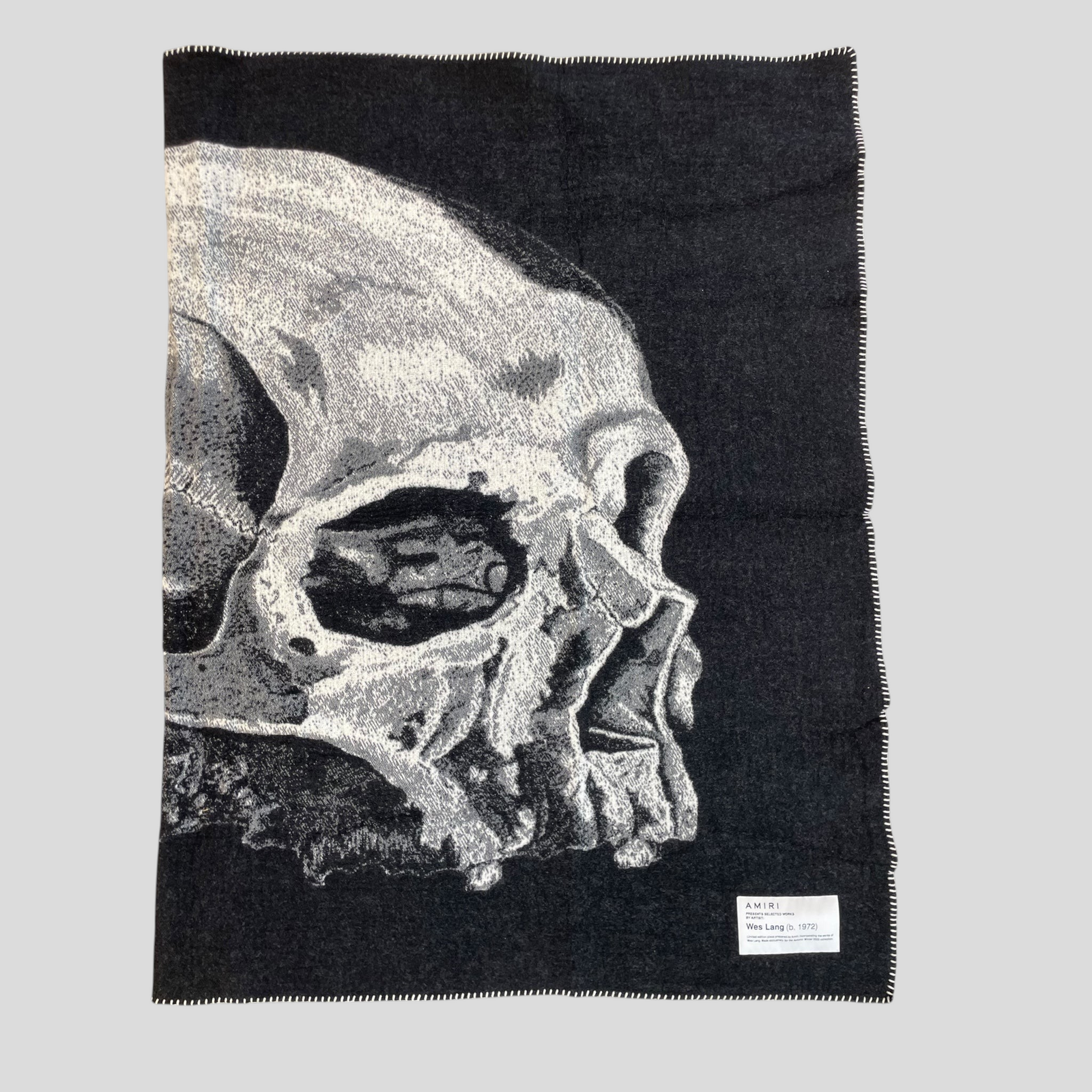 CLB XXIII Amiri X Wes Lang black wool fantasy blanket featuring a large white skull graphic and designer label patch.