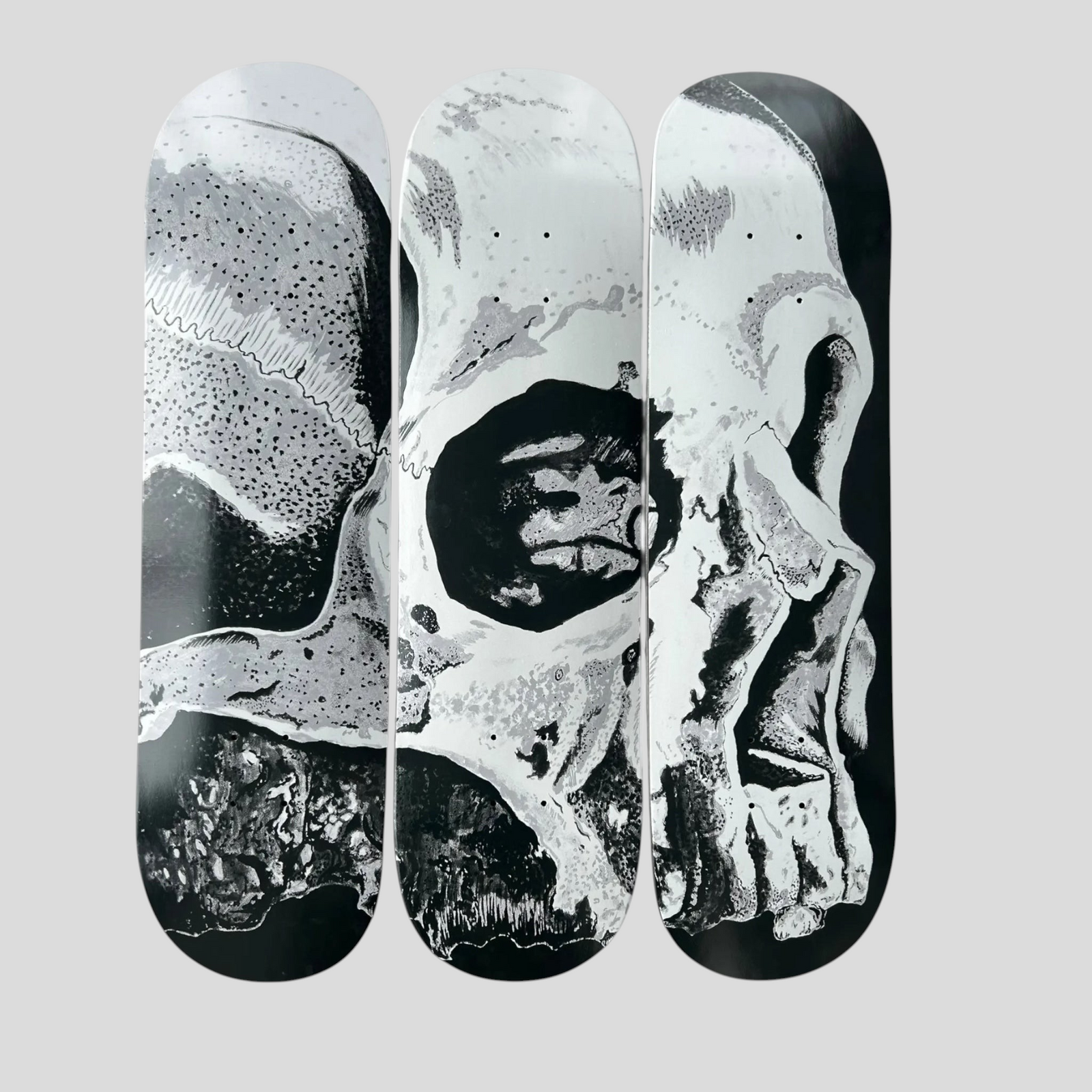 CLB XXIII Amiri x Wes Lang The Dream skate deck set featuring detailed black and white skull artwork on three boards