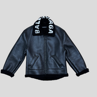 CLB XXIII Balenciaga black leather cocoon aviator jacket with white logo shearling collar and cuffs