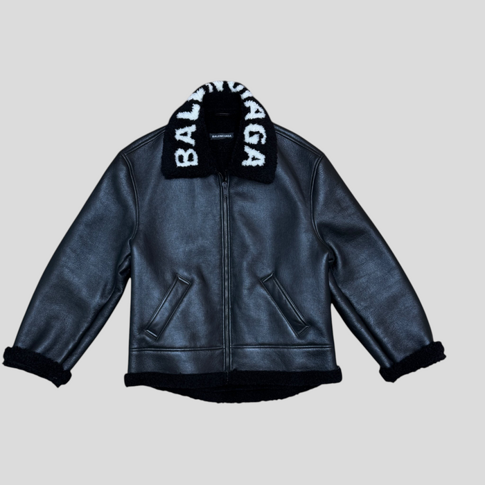 CLB XXIII Balenciaga black leather cocoon aviator jacket with white logo shearling collar and cuffs