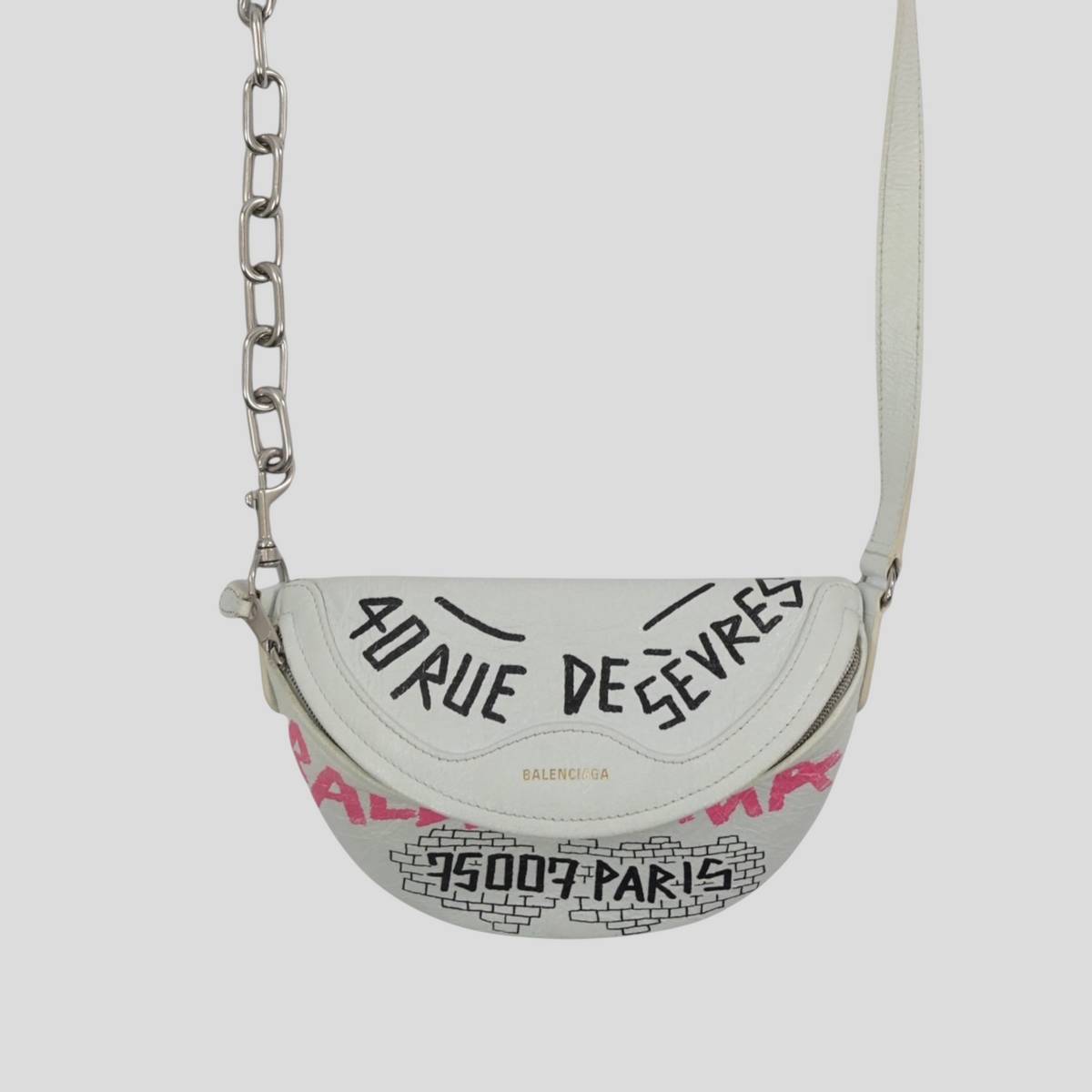 CLB XXIII Balenciaga XS white leather souvenir belt bag with black and pink graffiti print and silver chain strap