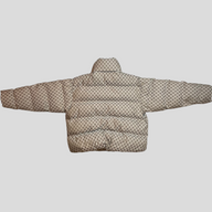 CLB XXIII Balenciaga X Gucci The Hacker puffer coat in brown with all-over monogram print, back view.