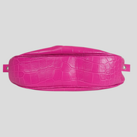 CLB XXIII Balenciaga Le Cagole XS shoulder bag in vibrant pink crocodile-embossed leather, bottom view.