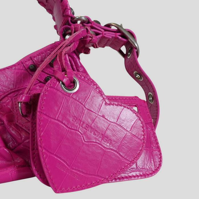 CLB XXIII Balenciaga Le Cagole XS shoulder bag in bright pink crocodile-embossed leather with heart-shaped mirror tag