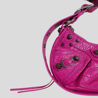 CLB XXIII Balenciaga Le Cagole XS shoulder bag in bright pink crocodile-embossed leather with silver-tone studs