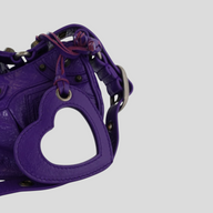 CLB XXIII Balenciaga Le Cagole XS shoulder bag in purple leather with a heart-shaped mirror charm and silver hardware
