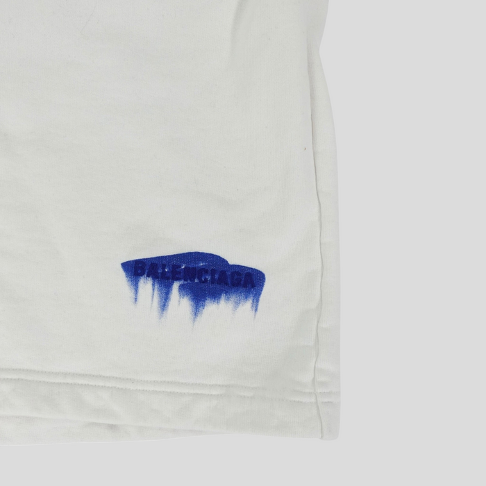 CLB XXIII Balenciaga white cotton relaxed shorts featuring a blue wet brush logo print on the leg