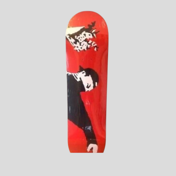 CLB XXIII Banksy Love Is In The Air skate deck featuring a red background with iconic flower thrower street art