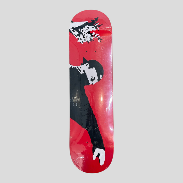 CLB XXIII Banksy Love Is In The Air skateboard deck featuring a red background with black and white stencil art