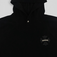 CLB XXIII black Chrome Hearts fleece pullover hoodie with a silver cross button and embroidered cross logo patch