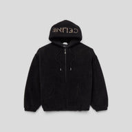 CLB XXIII black fleece zip-up hoodie featuring a studded Celine logo on the hood and a drawstring closure.