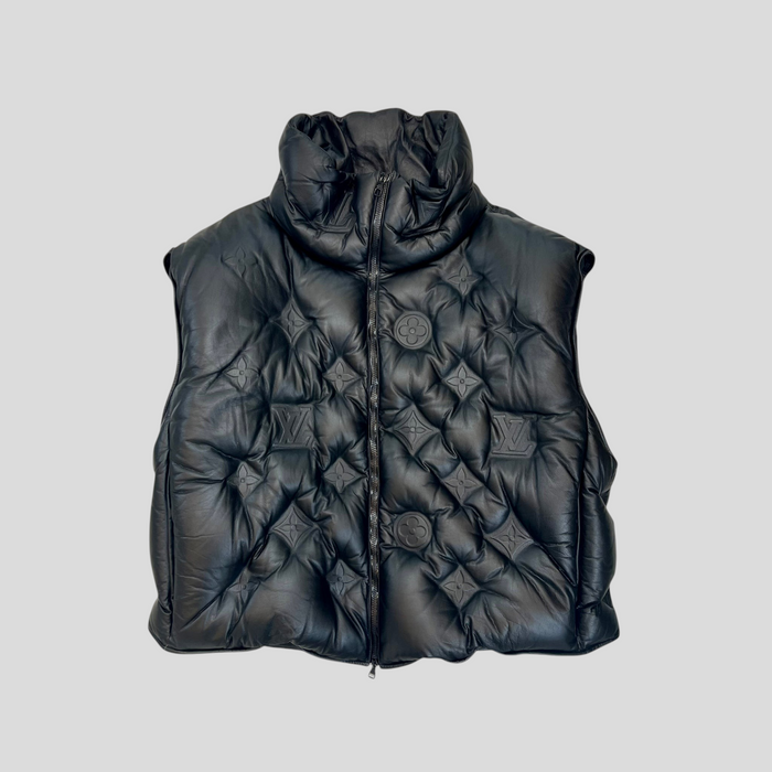 CLB XXIII black calfskin leather puffer vest featuring embossed Louis Vuitton monogram patterns and a zip-up front.