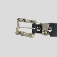 CLB XXIII Enfants Riches Déprimés black leather belt featuring an ornate silver buckle with rose and cross detailing.