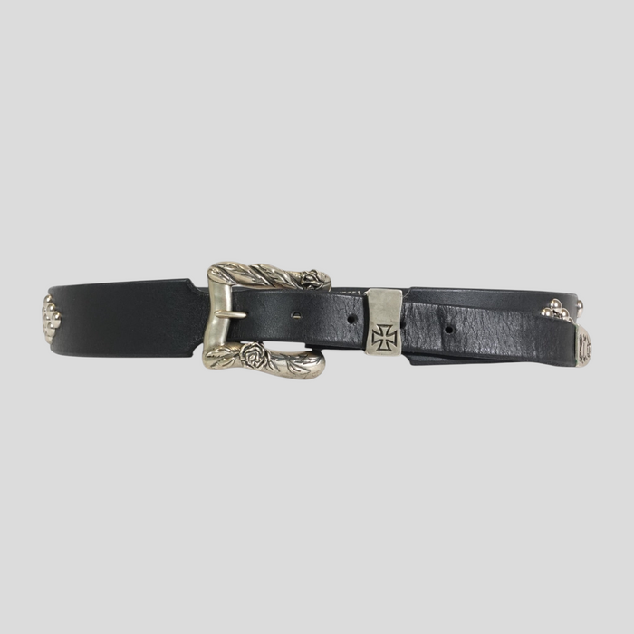 CLB XXIII Enfants Riches Déprimés black leather belt featuring a silver floral buckle and iron cross hardware.
