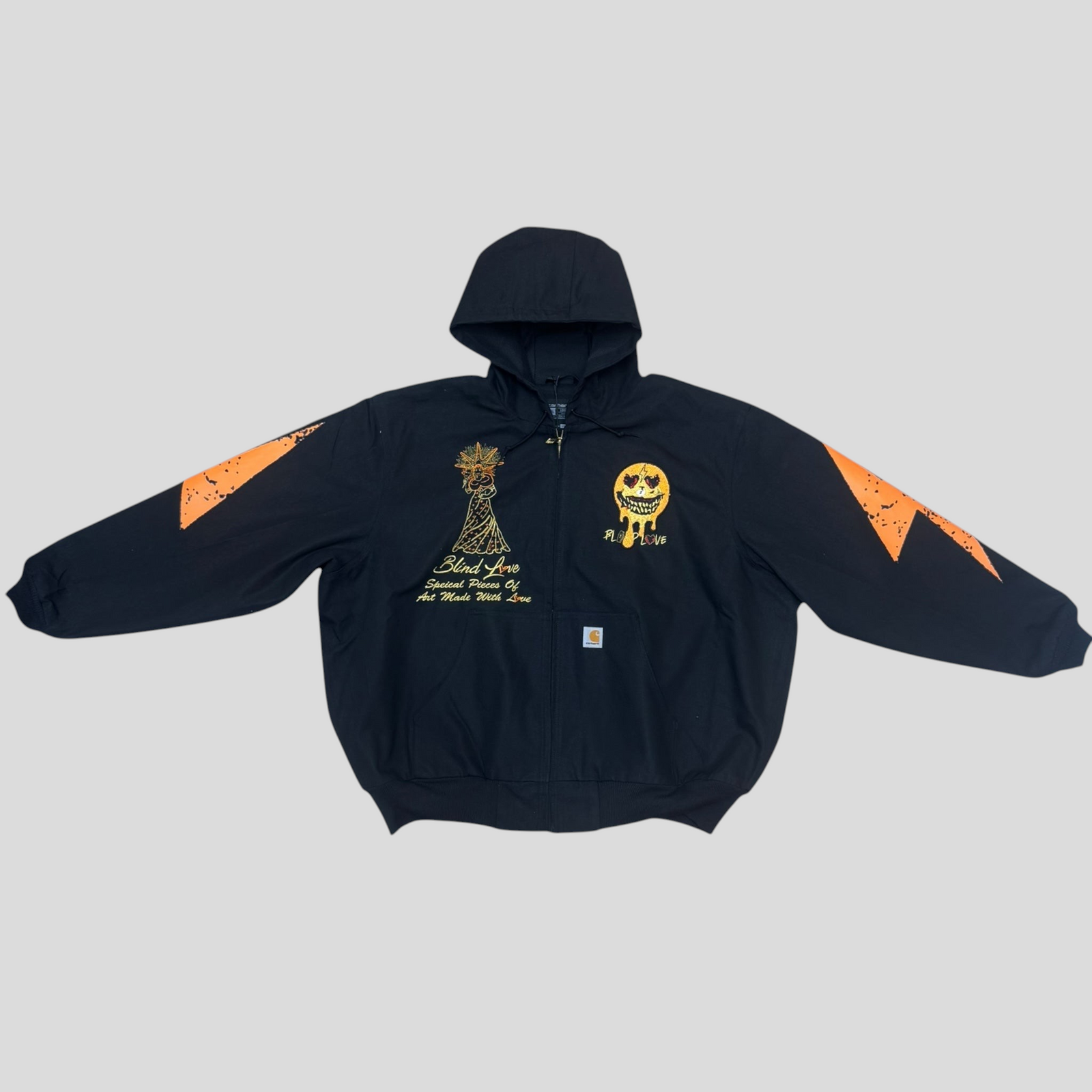 CLB XXIII black Carhartt jacket featuring orange patchwork sleeves and custom Blind Love embroidery and smiley graphic