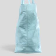 CLB XXIII Chrome Hearts blue leather tote bag with star patch detail and silver accents, side view