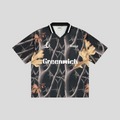 CLB XXIII Bravest Studios Greenwich soccer jersey featuring a dark forest tree branch print and gold autumn leaves.