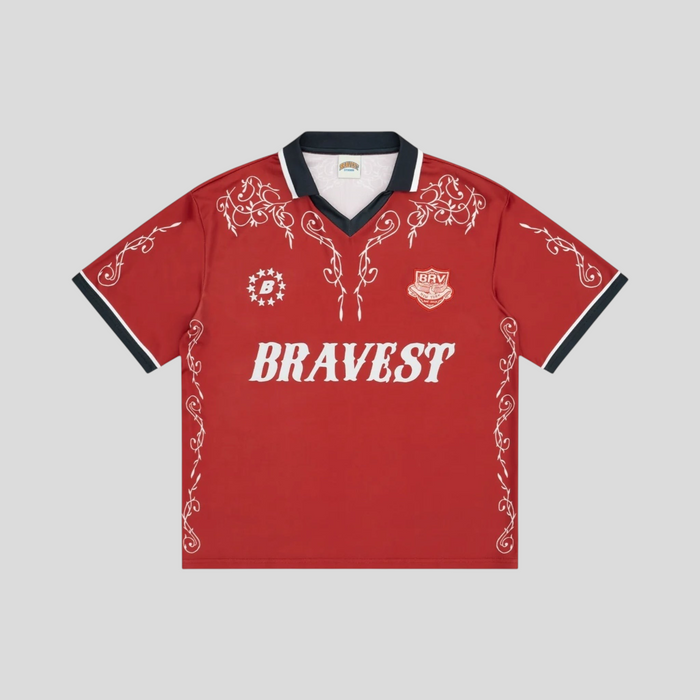 CLB XXIII Bravest Studios red western jersey with white floral embroidery, collar, and graphic logo details.