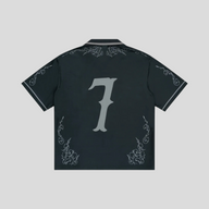 Back view of CLB XXIII Bravest Studios Cobalt Western Jersey in black with grey number 7 and ornate filigree detail