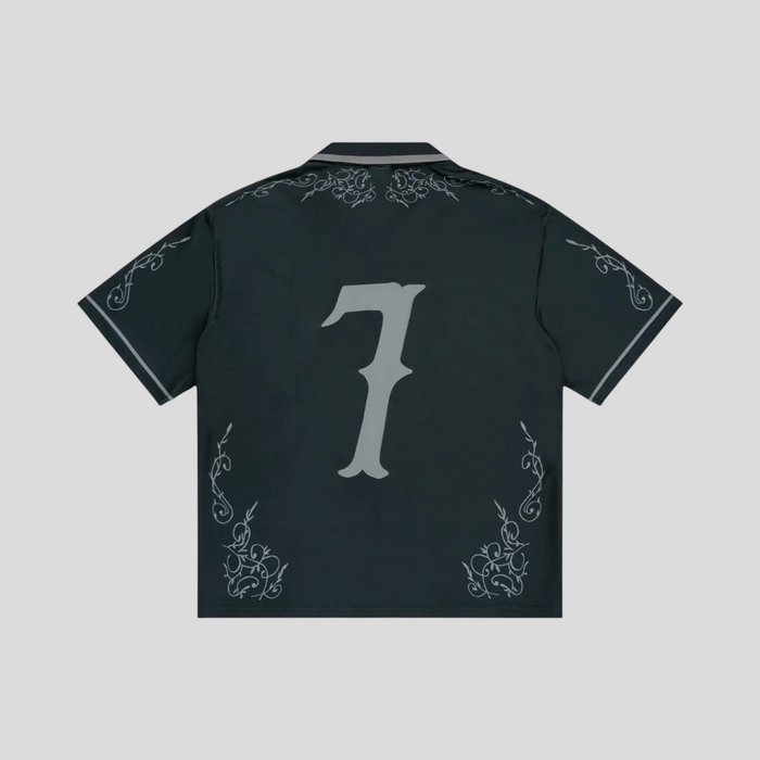 Back view of CLB XXIII Bravest Studios Cobalt Western Jersey in black with grey number 7 and ornate filigree detail
