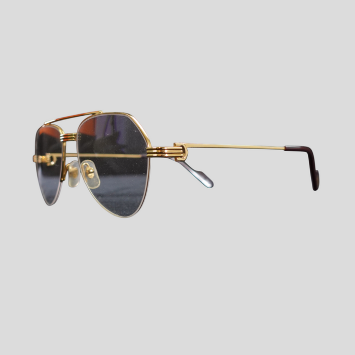 CLB XXIII gently used Cartier titanium glasses in gold with a classic aviator-inspired frame design