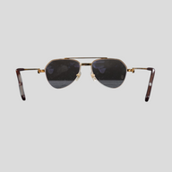 CLB XXIII gently used Cartier aviator glasses in gold titanium with dark lenses, rear view