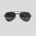 CLB XXIII gently used Cartier aviator glasses in gold titanium with dark lenses