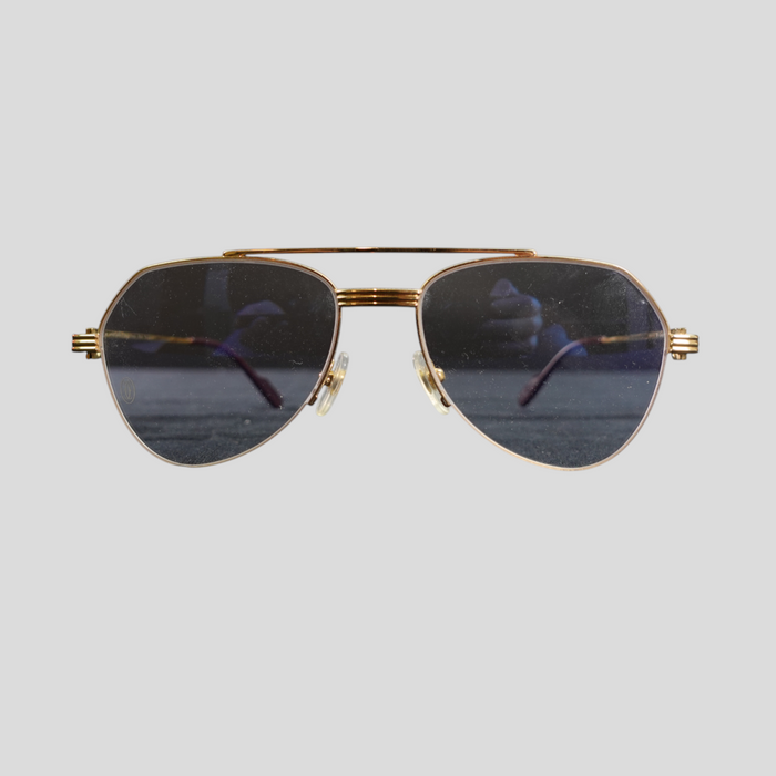 CLB XXIII gently used Cartier aviator glasses in gold titanium with dark lenses