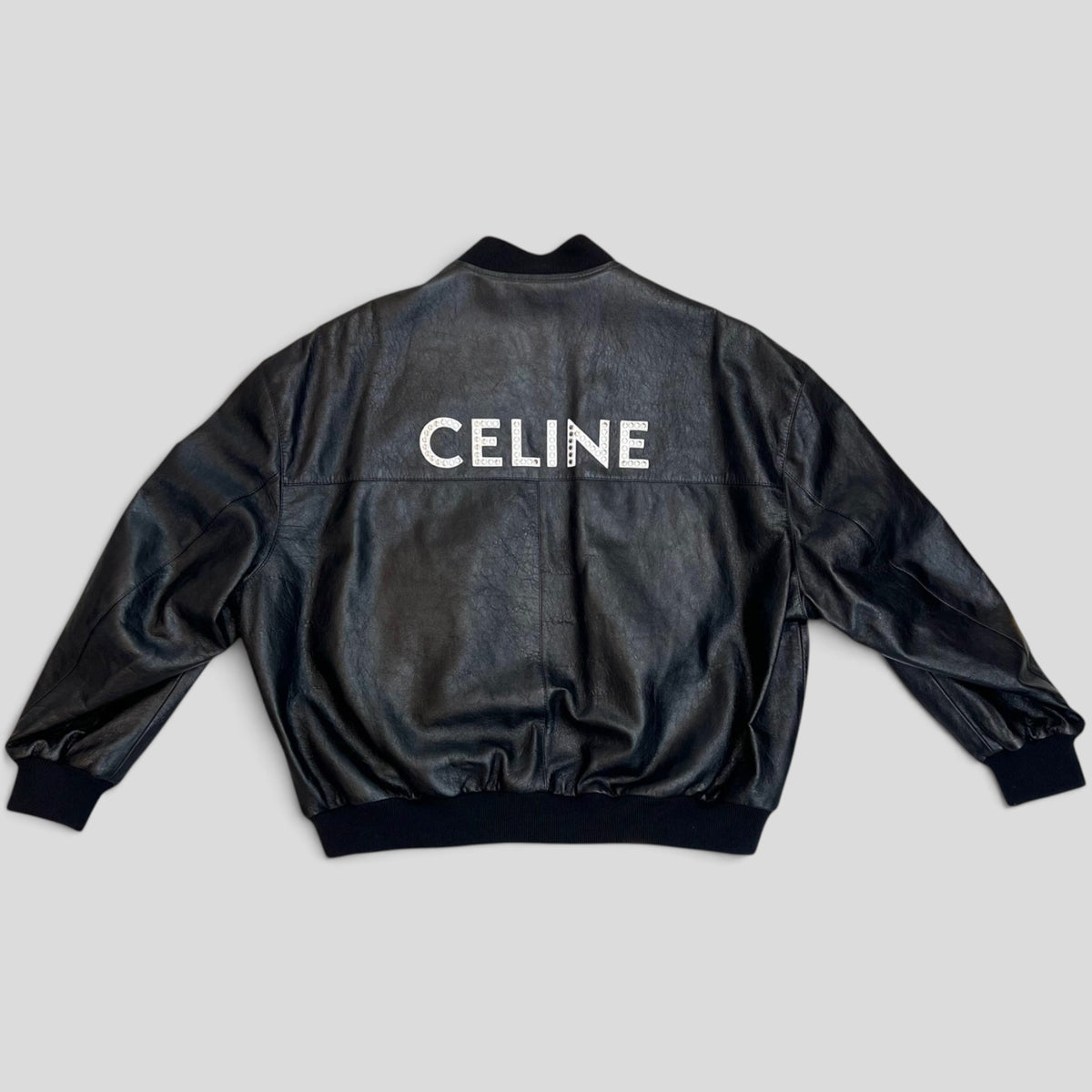 CLB XXIII Celine Homme black lambskin leather bomber jacket with studded logo on the back