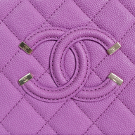 CLB XXIII Chanel Caviar quilted purple leather vanity case with iconic CC logo hardware detail