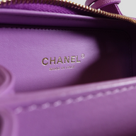 CLB XXIII Chanel Caviar quilted vanity case interior with gold embossed logo and Made in Italy stamp in purple leather