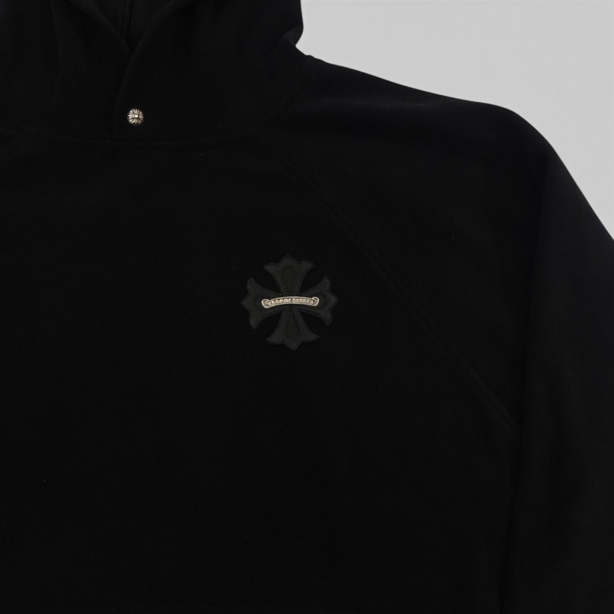 CLB XXIII black Chrome Hearts fleece pullover hoodie with signature silver cross hardware and chest patch