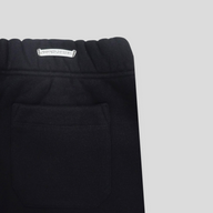 CLB XXIII Chrome Hearts black cotton sweatshorts featuring a signature silver logo plaque on the elastic waistband.